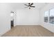Spacious bedroom with hardwood floors and ensuite bath at 329 Roxboro St, Haw River, NC 27258