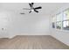 Bright bedroom with hardwood floors and large windows at 329 Roxboro St, Haw River, NC 27258