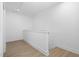 Clean hallway with light walls and wood-look floors at 329 Roxboro St, Haw River, NC 27258