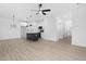 Open concept kitchen with island and modern appliances at 329 Roxboro St, Haw River, NC 27258