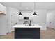 Modern kitchen with white cabinets, and stainless steel appliances at 329 Roxboro St, Haw River, NC 27258