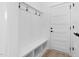 Convenient entryway with built-in bench and hooks at 331 Roxboro St, Haw River, NC 27258