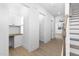 Clean hallway with built-in shelving and light wood flooring at 331 Roxboro St, Haw River, NC 27258