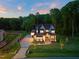 Spacious two-story home with a large lot, long driveway, and mature trees in a serene environment at 1621 Legacy Ridge Ln, Wake Forest, NC 27587