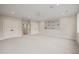 Spacious bonus room features neutral carpet, a ceiling fan, and ample closet space at 1621 Legacy Ridge Ln, Wake Forest, NC 27587