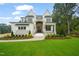 Charming two-story home with brick and stone details, fresh landscaping, and a welcoming front porch at 1621 Legacy Ridge Ln, Wake Forest, NC 27587