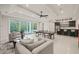 Finished basement or game room with a ping pong table and a walk out to the patio at 1621 Legacy Ridge Ln, Wake Forest, NC 27587
