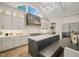 Open-concept kitchen features stone countertops, custom cabinetry, and modern lighting at 1621 Legacy Ridge Ln, Wake Forest, NC 27587