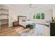 Bright main bedroom with hardwood floors and a large window for lots of natural light at 1621 Legacy Ridge Ln, Wake Forest, NC 27587
