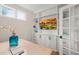 Cozy office space features a built-in bookcase, natural light, and a french door entry at 1621 Legacy Ridge Ln, Wake Forest, NC 27587