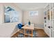 Bright home office features hardwood floors, natural light, and custom built-in shelving at 1621 Legacy Ridge Ln, Wake Forest, NC 27587