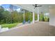 This brick paver patio features four Adirondack chairs and a fire pit at 1621 Legacy Ridge Ln, Wake Forest, NC 27587