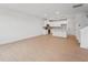 Open floor plan with hardwood floors throughout the living room and kitchen area at 814 Barlow Dr, Knightdale, NC 27545