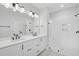 Bathroom with double vanity, frameless shower, and modern fixtures at 1505 Patchings Ln, Knightdale, NC 27545