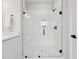 Bright bathroom showcasing a walk-in shower with black hardware, white subway tile, and a built-in bench at 1505 Patchings Ln, Knightdale, NC 27545