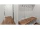 Hallway featuring coat rack and bench with shelves at 3691 Graham Sherron Rd, Wake Forest, NC 27587