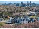 An aerial scene displays this home's location and nearby buildings at 618 Velma Hopkins Ln, Raleigh, NC 27603