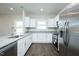 Open kitchen featuring granite countertops, stainless steel appliances, and modern lighting at 105 Ambergate Ct, Rocky Mount, NC 27804