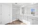 Modern bathroom with double vanity and walk-in shower at 292 Chestnut Oak Ln, Lillington, NC 27546