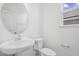 Simple bathroom with toilet and vanity at 292 Chestnut Oak Ln, Lillington, NC 27546