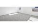 Bright and airy bedroom with neutral carpeting and large windows at 292 Chestnut Oak Ln, Lillington, NC 27546