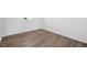 Bright bedroom featuring wood-look flooring at 292 Chestnut Oak Ln, Lillington, NC 27546