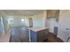 Open kitchen with island and view of dining and living area at 191 Robert Howe Dr, Fuquay Varina, NC 27526