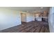 Open-concept floorplan shows a spacious and bright living room leading to a modern kitchen at 191 Robert Howe Dr, Fuquay Varina, NC 27526