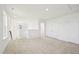 Neutral loft space with carpeted floors and bright natural light at 401 Winding Creek Dr, Lillington, NC 27546