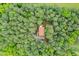 Aerial view of a secluded home surrounded by lush green trees and a long driveway at 2723 New Sharon Church Rd, Hillsborough, NC 27278