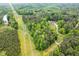 Overhead view of a private, wooded homesite accessible by a long driveway for enhanced seclusion at 2723 New Sharon Church Rd, Hillsborough, NC 27278
