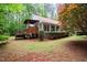 Charming home with a wooden deck, perfect for outdoor entertaining and enjoying the serene backyard at 2723 New Sharon Church Rd, Hillsborough, NC 27278