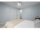 Bedroom with neutral tones, carpeted floors, double closets and view to another room at 2723 New Sharon Church Rd, Hillsborough, NC 27278