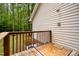 View of an outdoor shower on a wooden deck for outdoor living at 2723 New Sharon Church Rd, Hillsborough, NC 27278