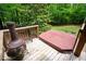 Wooden deck features a hot tub, offering an ideal space for unwinding at 2723 New Sharon Church Rd, Hillsborough, NC 27278