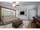 Comfortable living space with modern furnishings, including built-in shelves and a cozy sofa at 2723 New Sharon Church Rd, Hillsborough, NC 27278