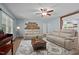 Spacious living room showcasing hardwood floors, plush sofas, and stylish decor at 2723 New Sharon Church Rd, Hillsborough, NC 27278