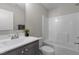 Neutral bathroom featuring a shower/tub combination and a vanity with storage at 30 Diamond Creek Dr, Zebulon, NC 27597