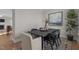 Cozy dining space featuring a rustic wood table, decorative art, and neutral wall colors at 30 Diamond Creek Dr, Zebulon, NC 27597