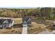Aerial view of a home with a long driveway and two-car garage at 30 Diamond Creek Dr, Zebulon, NC 27597