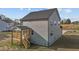 Side exterior of new construction home with a wooden deck and stairs at 30 Diamond Creek Dr, Zebulon, NC 27597