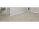 Hallway featuring neutral walls, carpet, and white trim at 30 Diamond Creek Dr, Zebulon, NC 27597