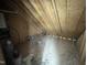 Picture of an unfinished attic space with exposed beams, offering potential for future development at 4905 Hidden Pasture Way, Zebulon, NC 27597