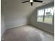A serene bedroom with ample natural light from a large window, creating a bright, inviting space at 4905 Hidden Pasture Way, Zebulon, NC 27597