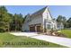 Two-story house with large driveway and two car garage at 4905 Hidden Pasture Way, Zebulon, NC 27597