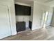 Stylish living room featuring hardwood floors, dark cabinets and new electrical outlets at 4905 Hidden Pasture Way, Zebulon, NC 27597