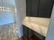 Cozy office nook with built-in cabinets, granite counter and plenty of storage space at 4905 Hidden Pasture Way, Zebulon, NC 27597