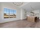 Bright dining area with hardwood floors and kitchen views at 4909 Hidden Pasture Way, Zebulon, NC 27597