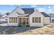 Exterior view of two-story home with large backyard at 4909 Hidden Pasture Way, Zebulon, NC 27597