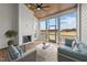Inviting screened porch with a fireplace, ceiling fan, and outdoor seating area at 4909 Hidden Pasture Way, Zebulon, NC 27597